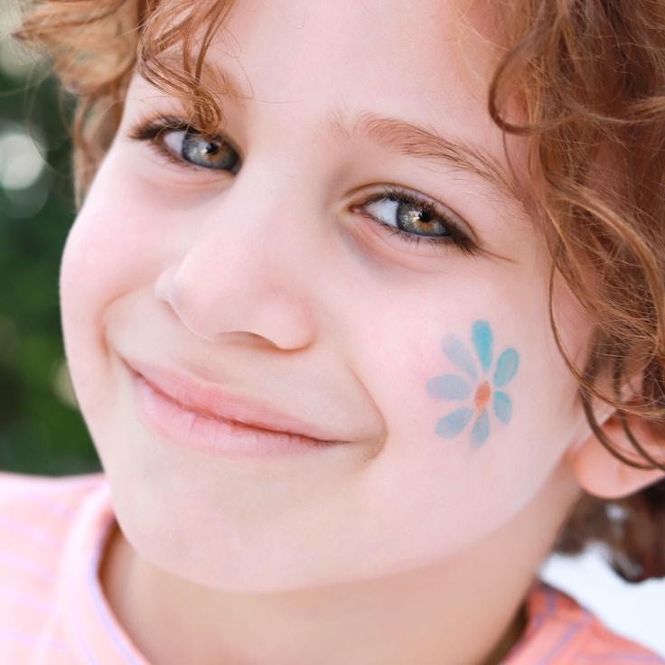 Kaveri Mehta, Lead Design Curator at Cascade Vale Plume, reviewing corporate floral arrangements